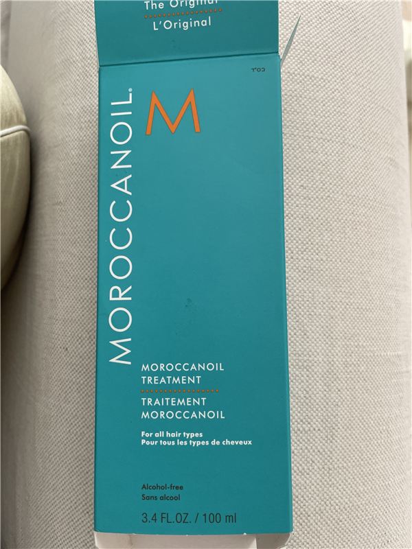 Moroccanoil Treatment — firuzəyi qutunun ön tərəfi